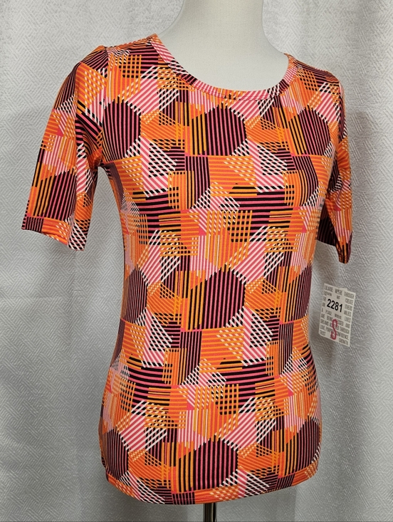 LuLaRoe Tops - LuLaRoe Gigi Short Sleeve Shirt Geometric Top Orange, Pink & Black